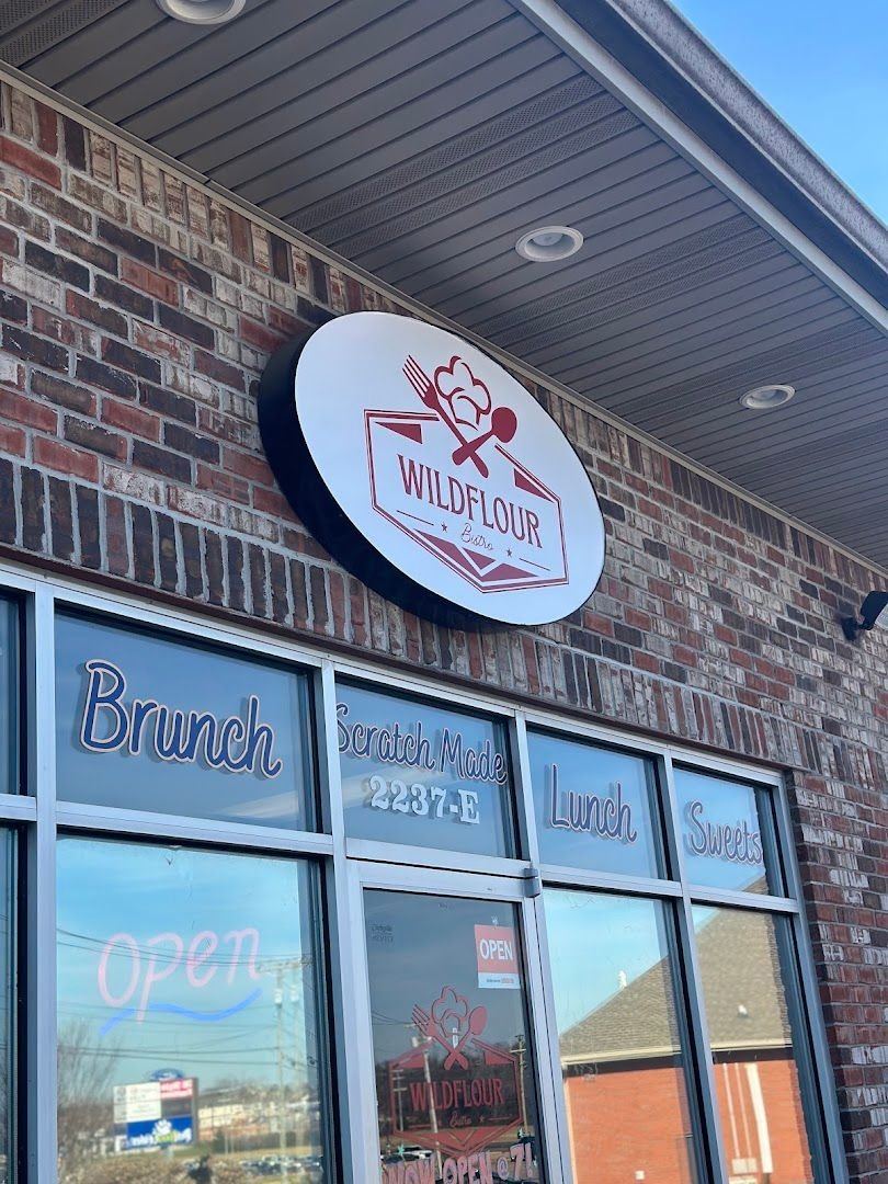 The Wildflour Bistro storefront with its round red sign