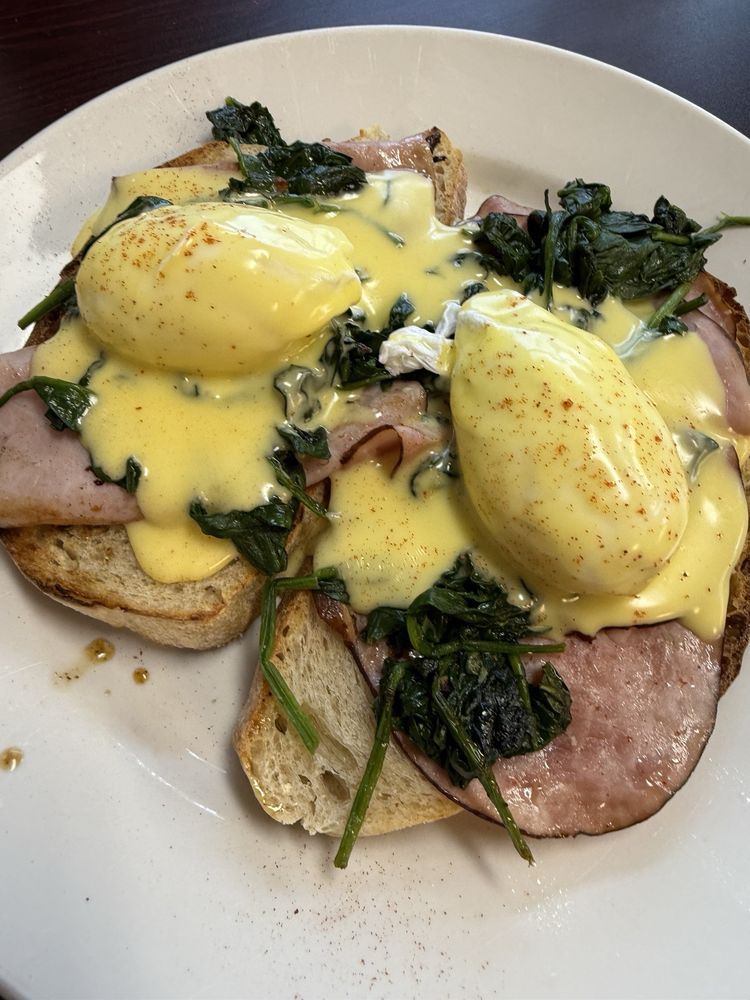 Eggs Benedict with hollandaise and spinach